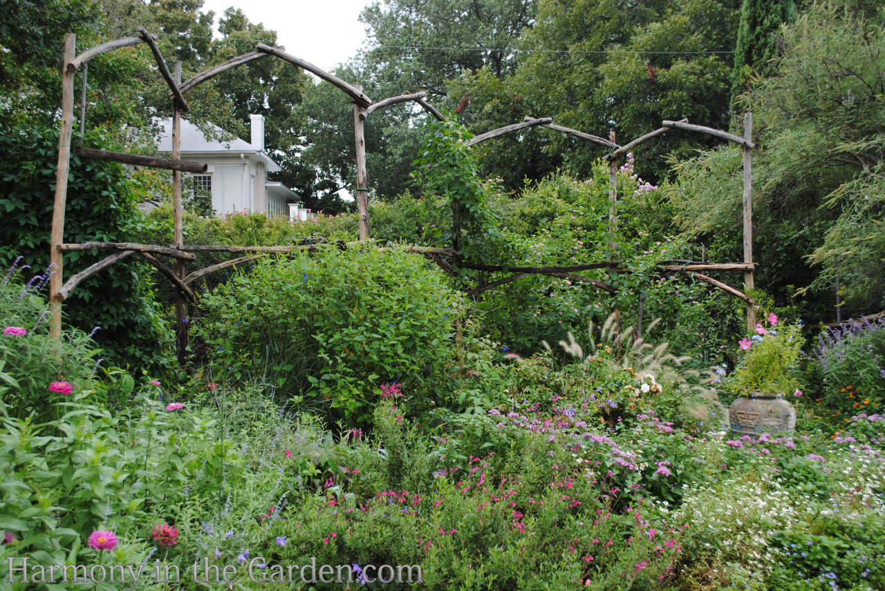 four season structure with trellises tuteurs obelisks